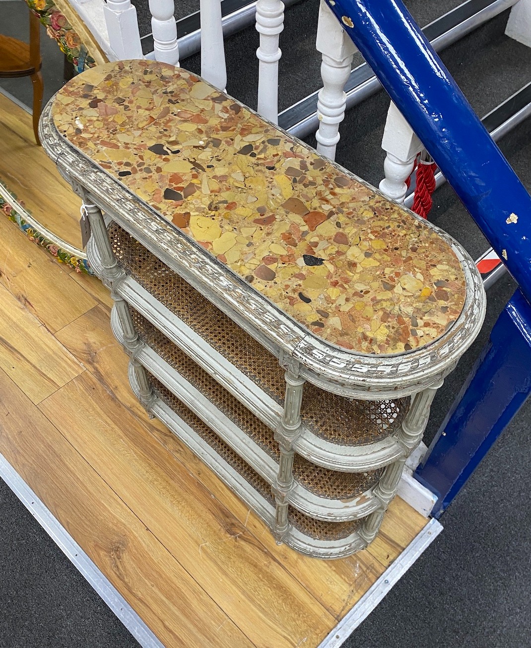 An early 20th century French painted marble topped four tier caned etagere, width 78cm, depth 30cm, height 84cm